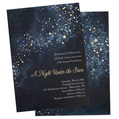 two black and gold wedding cards with stars in the night sky on top of them