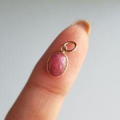 ✪Gold weight: 230 milligram ✪Stone size: 8x6 mm ✪Bail size: 5 mm ✪Without bail: 11 mm ✪Metal: 18k solid yellow gold ✪Gemstone: Rhodonite ✪Setting type: Bezel wire setting If you need any other preferred stone please contact us. QUALITY OF MATERIALS: Metal: Most of our jewelry at JewelryMansion is made with precious metals like gold and silver. These metals are 100% non-allergic to our skin. Gemstone: All of our jewelry is made by handpicked gemstones. Due to the nature of these gemstones a sligh Bezel Wire, Solid Gold Charms, Birthstone Gifts, Handmade Charms, October Birthstone, October Birth Stone, Gold Charm, Solid Yellow, Precious Metals