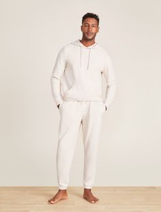 From our Barefoot Dreams Malibu Collection®, stay warm and cozy in this Brushed Fleece Hoodie. Crafted of super soft fleece, this hoodie features rib detail at the neck, cuffs, hemline, and kanga pocket for a modern look. It hits at the hip and features cotton drawcords at the neckline. Matches our Malibu Collection Men's Brushed Fleece Jogger. Model is 6'2" and wearing a size L. Hoodie Model, Fleece Joggers, Fleece Hoodie, Stay Warm, Warm And Cozy, Comfort Fit, How To Wear, Clothes