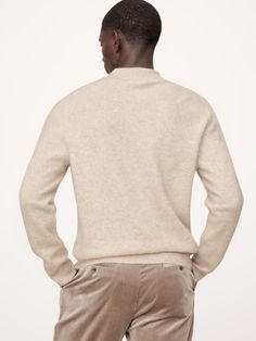 Our softest cashmere yet, this brushed cashmere sweater is spun for a unique bouclé texture and finely peach-fuzzed finish, employed here to create a luxuriously soft, delightfully retro sweater polo.  Standard fit.  Good Cashmere Standard™: The cashmere for this product is produced according to the Good Cashmere Standard™, which aims to improve the welfare of the cashmere goats, protect natural resources, and support local farmers.  Polo collar with button placket.  Straight hem.  Standard fit.  Long sleeves.  Hip length.  Model: Size M, 6'2" (188cm). Fitted Long Sleeve Cashmere Polo Sweater, Cozy Long Sleeve Cashmere Polo Sweater, Casual Cashmere Half-zip Sweater, Brown Long Sleeve Cashmere Polo Sweater, Cashmere Half-zip Sweater, Sweater Polo, Support Local Farmers, Retro Sweater, Natural Resources