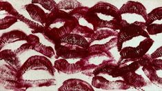 an image of red lipstick on white paper