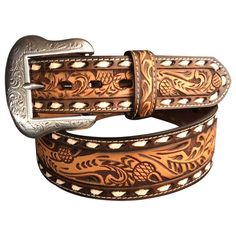 The Roper Tapered Floral Genuine Leather Belt for Men combines style and durability. This Roper belt sports genuine leather in a unique tapered design from 38mm25mm, with a natural floral tooled center, creme-color stitched edges, and cut edges accented with bone leather buck lacing. The Western-floral buckle in silver finish completes the rustic yet sleek look of this men's leather belt. Imported.Manufacturer style #: 8625500.   Genuine leather  Natural floral tooled center  Creme-color stitche Ariat Belts, Country Belts, Floral Tools, Black Betty Boop, Cute Country Outfits, Black Betty, Belt For Men, Creme Color, Leather Belts Men