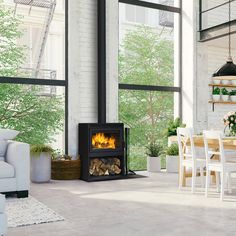 a living room filled with furniture and a fire place in the middle of a room