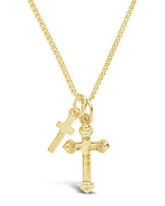 Two beautiful gold cross pendants hang from this delicate chain, giving it a little more flair than a traditional single cross necklace. It's an ideal gift for anyone who's about to celebrate a wedding, a confirmation or a First Communion. Made from high quality materials to last for years to come. Materials: 14K Gold plated Brass Features: Approx. 16" chain with 2" extender featuring sturdy lobster clasp, 14mm & 10mm cross charms Mens Gold Jewelry, Gold Cross Necklace, Jewelry Accessories Ideas, Gold Cross Pendant, Dope Jewelry, Statement Drop Earrings, Jewelry Lookbook, Delicate Chain, Cross Jewelry