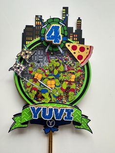 a pizza themed clock with the number four on it's face and an image of teenage mutants