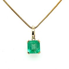 "8.34-carat Colombian Emerald solitaire pendant set in 14k gold basket 4-prong mounting. Comes with a detachable bail that fits any chain up to 6mm. Original bail fits 1mm-1.5mm chain. The emerald center stone features excellent color, luster, and brilliance. Set in a perfectly contrasting yellow gold mounting that lets the emerald take center stage and speak for itself. Details: ✔ Metal: 14K solid gold ✔ Gold Tone: Yellow gold ✔ Size: 13.7mm x 12.94mm x 9.95mm ✔ Bail Attachement: 14K Gold Emera Classic Emerald Pendant Necklace With Diamond Cut, Classic Emerald Diamond Cut Pendant Necklace, Classic Diamond Cut Emerald Pendant Necklace, Classic Yellow Gold Emerald Pendant Necklace, Classic Emerald Pendant Necklace In Bezel Setting, Classic Emerald Pendant Necklace With Prong Setting, Classic Bezel Set Emerald Pendant Necklace, Classic Emerald Pendant Necklace With Bezel Setting, Classic Yellow Gold Necklace With Bail Detail