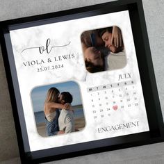 a calendar frame with two photos and the date on it