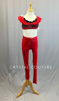 Red camisole bra top has Red ruffle along neckline and on straps. Black appliques on front of chest and Black ruffle peeking out of neckline. Paired with Red leggings with tie front waistband. 5.5 Gross of Jet Hematite 9ss, 12ss, 16ss, 20ss and 30ss Rhinestones! **Costume in image is a YM, Photographed on a YM/YL Mannequin with Measurements of: Bust 27", Waist 24", Hip 27", Girth 47" Fitted Red Ruffled Sets, Fitted Red Bottoms With Ruffles, Fitted Red Ruffled Bottoms, Red Ruffled Sleeveless Sets, Sleeveless Red Ruffled Set, Trio Costumes, Sequin Jewelry, Red Camisole, Costumes Couture