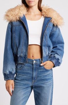 A casual-cool denim bomber is crafted in a classic indigo wash and elevated with a luxuriously plush faux-fur collar. 21" length (size Medium) Front zip closure Wing collar Elastic cuffs and hem Side-seam pockets Lined 100% cotton with 100% polyester faux-fur collar Machine wash, tumble dry Imported Winter Medium Wash Denim Jacket With Zipper Closure, Winter Denim Jacket With Zipper Closure In Medium Wash, Winter Outerwear With Zipper Closure In Medium Wash, Fall Denim Outerwear With Zipper Closure, Fall Medium Wash Outerwear With Zipper Closure, Fall Medium Wash Outerwear With Zipper, Trendy Denim Blue Outerwear With Zipper Closure, Trendy Denim Blue Outerwear With Zipper, Trendy Medium Wash Outerwear For Winter