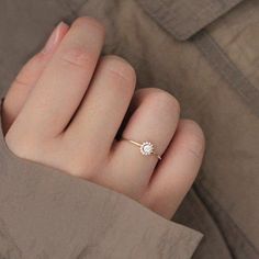 Dainty Cubic Zirconia Crystal Ring For Proposal, Dainty Diamond Birthstone Ring For Proposal, Dainty Diamond White Ring For Proposal, Dainty Promise Cluster Ring With Prong Setting, Rose Gold Flower Ring With Center Stone For Promise, Dainty Round Cut Diamond Ring For Proposal, Dainty Round Cut Diamond Proposal Ring, Dainty Diamond White Cluster Ring, Dainty Round Cut Ring For Proposal