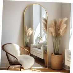 a mirror sitting next to a white couch in a living room