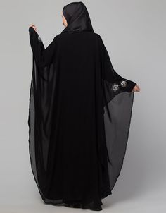 Beautiful Black Color Mirrow Work Abaya easy to wear Back close with loop, button & zip, easy to wear embroidery On Chest Hijab and band shown in the image can be bought separately Fabric: PartyCare: Mild machine wash/ hand Cold Wash/Dry cleanWe request customers to carefully choose the correct size and dress length referring to our size chart Black Long Khimar For Eid, Long Sleeve Black Khimar For Eid, Black Long Sleeve Khimar For Eid, Black Khimar For Eid, Black Long Sleeve Hijab For Eid, Traditional Black Dabka Khimar, Long Black Abaya For Eid, Black Long Sleeve Khimar With Dabka, Traditional Black Long Sleeve Khimar