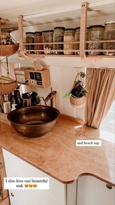 the kitchen counter is clean and ready to be used as a storage area for spices