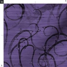 an abstract purple background with black swirls and circles on it's surface,