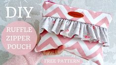 a pink and white chevroned purse with ruffles on the bottom, free pattern