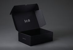 an open black box sitting on top of a table