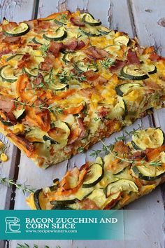 two slices of pizza with bacon, zucchini and corn slice toppings on them