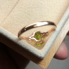 A simple silver setting with a 8x6mm Peridot and 2 2.75mm CZ accents. (prices subject to change depending on stone, metal, and size) ⇢Metal Available: ✦ Silver ✦ 14kt Gold Oval Peridot Rings Fine Jewelry, Peridot Rings With Polished Finish, Stackable Peridot Promise Ring, Polished Peridot Ring, Minimalist Oval May Birthstone Rings, Peridot Engagement Ring, Peridot Engagement Rings, Gold Rate, Oval Ring