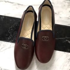 Chanel Burgundy Calf Leather Cc Logo Loafer Slip On 36. New With Box Designer Leather Slip-ons For Work, Luxury Loafers With Red Sole For Work, Luxury Slip-on Loafers With Red Sole, Designer Slip-on Flats With Leather Sole, Designer Loafers With Leather Footbed And Flat Heel, Luxury Calf Leather Slip-ons With Flat Heel, Chic Leather Flats With Red Sole, Luxury Flat Loafers With Leather Footbed, Luxury Calf Leather Round Toe Slip-ons