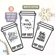 three coffee cups with the words cup cozy on them and snowflakes in the background