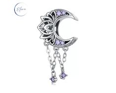 Purple Moon & Lotus Dangle Charm Dazzling purple crystals set on the crescent moon with a lotus flower outline. 2 small purple stones dangle on chains from the bottom of the moon. Suitable for all European style bracelets such as Pandora and can also been worn as a pendant on your favourite necklace. 925 Sterling Silver Purple Crystals Clear Cubic Zirconias You will receive your charm in a protective jewellery pouch and polishing cleaning cloth to keep your charm in perfect condition. Shipping i Purple Pandora Charms, Elegant Purple Crescent Jewelry, Purple Crescent Spiritual Jewelry, Spiritual Purple Crescent Jewelry, Purple Crescent Moon Phase Jewelry, Purple Crescent Moon Charm Jewelry, Lotus Flower Outline, Moon Lotus, Pandora Purple