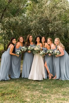 a group of bridesmaids posing for a photo