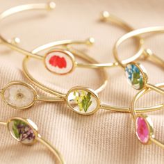 Celebrate your loved one's birthday with this intricate birth flower bangle, complete with a pressed floral! Pressed Floral, Pink Jewelry Box, Colorful Bangles, Dainty Jewellery, Lisa Angel, Angel Jewelry, Brass Bangle, Floral Bracelet, Brass Band