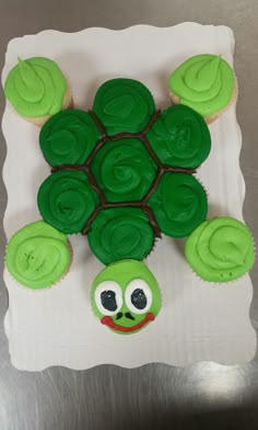 cupcakes in the shape of a turtle with green frosting