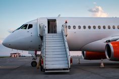 an airplane with stairs leading up to it