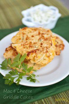 an omelet on a white plate with parsley