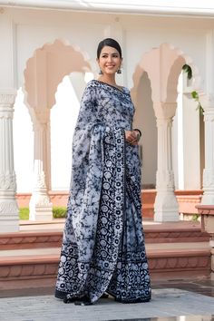 This beautiful handmade Batik print saree is a celebration of traditional Indian craftsmanship. Made from pure cotton, the saree is soft, breathable, and comfortable, perfect for all-day wear. With a length of 6.4 meters, it drapes elegantly, showcasing intricate Batik designs that are both timeless and stylish. The accompanying blouse piece measures 0.90 meters, allowing for a perfect fit. Ideal for both casual and festive occasions, this saree adds a touch of grace and sophistication to any wardrobe. - **Material Pure Cotton for ultimate comfort and breathability. - **Design Traditional Batik print, showcasing intricate handmade designs. - **Saree Length 6.4 meters, providing ample fabric for elegant draping. - **Blouse Piece Includes a 0.90-meter blouse piece, customizable for a perfect Festive Cotton Traditional Wear With Batik Print, Festive Cotton Pre-draped Saree With Printed Border, Bohemian Batik Print Saree With Traditional Drape, Bohemian Batik Print Saree For Diwali, Bohemian Saree With Batik Print, Bohemian Batik Print Saree For Festive Occasions, Bohemian Batik Print Traditional Saree, Bohemian Batik Print Saree, Traditional Batik Print Saree For Diwali