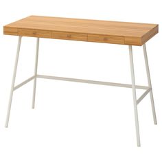 a wooden desk with two white legs