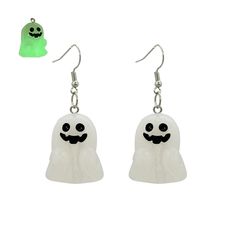 the ghost earrings are glow green and have black eyes, with a white ghost on it's head