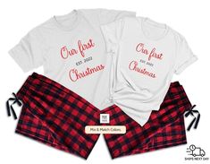 two matching christmas pajamas with the words our first christmas printed on them in red and black