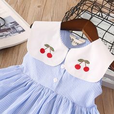 Product Title: Girls Lapel Striped Dress Sleeveless Cherry Embroidered Princess DressKeyword Tag: Bulk Toddler Socks*Pattern: Fruit*Soft Feeling & Cozy Comfortable* Available for Machine Wash as well as TumbleDry* Imported Are you look for a best quality and affordable dress? Then Girls Lapel Striped Dress Sleeveless Cherry Embroidered Princess Dress is the best one for you! The New style with amazing designs for reflect fashion vibes that will embrace you the moment you wear them. The pattern o Cute Sleeveless Dress With Floral Embroidery, Cute Doll Collar Dresses For Summer, Cute Doll Collar Summer Dresses, Cute Summer Dresses With Doll Collar, Summer Embroidered Dress With Doll Collar, Sleeveless Summer School Dress, Cute Cotton Sleeveless Dress, Blue Doll Collar Summer Dress, Cute Sleeveless Cotton Dress