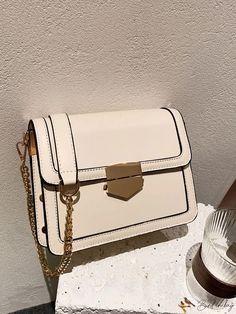 BirdinBag - Square Flap Bag with Metal Studs and Intricate Decor White Flap Bag With Top Handle For Gift, White Top Handle Flap Bag As Gift, White Top Handle Flap Bag For Gift, Elegant Large Capacity Pouch Flap Bag, Beige Rectangular Bag With Hasp Closure, Beige Square Bag With Hasp Closure, Square Beige Bag With Hasp Closure, Rectangular Shoulder Bag With Hasp Closure As Gift, Rectangular Shoulder Bag With Hasp Closure For Gift