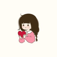 a girl holding a heart in her hands