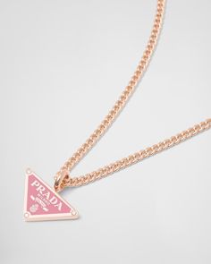 Luxury Pink Jewelry With Chain, Luxury Pink Chain Necklace, Designer Diamond Jewelry With Polished Finish, Designer Pendant Chain Jewelry, Luxury Pink Necklaces With Brilliant Cut, Luxury Pink Necklace With Brilliant Cut, Luxury Pink Jewelry With Logo Charm, White Formal Jewelry With Logo Charm, Formal White Jewelry With Logo Charm