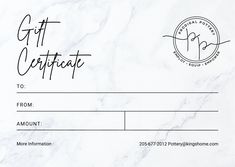 a gift certificate is shown on a marble background