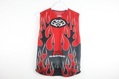 a red and black shirt with flames on it