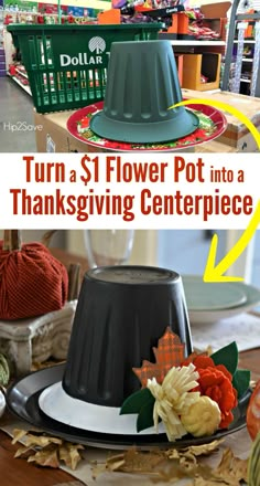 a black and white hat sitting on top of a table next to other thanksgiving decorations