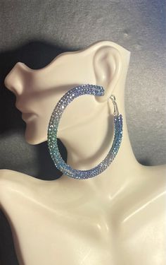 "Large Blue Green Clear Rhinestone Hoop Earrings , Crystal Rhinestone Hoop Earrings , Bling Earrings , Statement Earrings 2 1/2 \" in diameter Beautiful Earrings will make a statement ! They are not heavy so you won't be ready to take them off  Ask questions as I do not accept returns  Thank You !"