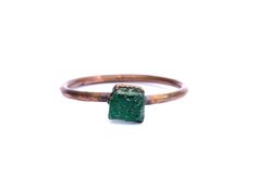 Rough emerald ring | Raw Emerald birthstone ring | Raw stone jewelry | Raw emerald jewelry | Raw emerald ring | May birthstone jewelry This listing is for one small green emerald crystal electroformed to a hand-hammered 16 gauge recycled copper ring.  If your size is unavailable, please select "custom" from the drop down menu and indicate the size you need at check out. Our jewelry is unique and one-of-a-kind. Please note there will likely be variances in the size, shape and color of each stone. Raw Emerald Jewelry, Raw Emerald Ring, Emerald Birthstone Ring, Smaragd Ring, Raw Stone Jewelry, Raw Emerald, Emerald Crystal, Emerald Birthstone, Tiny Studio