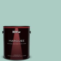 a can of marquee on a green background