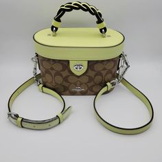 100% Authentic Brand: Coach Name: Signature Kay Crossbody Brd Color: Khaki Pale Lime Model: Cj613 (W) 7.75" (H) 5.25" (D) 3.75" Handle Drop: 2.5" Strap Drop: 22.5" Adjustable/Detachable Retail Price: $378.00 Usd Pale Lime Smooth Leather And 2 Toned Khaki Medium "C" Coated Canvas Silver 'Coach Heritage Coach Emblem Closure: Lid W/ Turn Lock Hardware: Silver Tone Stitching: Pale Lime/Khaki Handle: Braided Pale Lime Leather W/ Mahogany Edging Strap: Pale Lime Leather W/ Silver Chain Silver Metal Co Luxury Bags Collection, Name Signature, Trunk Bag, Chain Silver, Coach Leather, Color Khaki, Smooth Leather, Coach Bags, Trunk