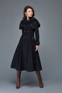 "Vintage inspired but modern princess wool coat that will keep you warm and stylish this winter, Excellent high-quality winter outwear that don't miss it. ★★ FEATURES 50% wool, other fiber,nylon Polyester lining Two side pockets Removable small cape Stand-up collar Double-Breasted buttons closure Long sleeve with button tabs to the cuffs Regular fit Perfect for winter,spring,autumn ★★ The model's height approx 170cm (5′ 7″) with the 84cm (33\") bust, 66cm (26\") waist. She is wearing the wool co Fit And Flare Coat, Military Style Coats, Princess Coat, Long Black Coat, Fitted Coat, Black Winter Coat, Tailored Coat, Military Coat, Long Wool Coat