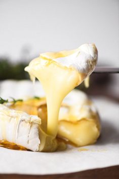 a close up of food on a plate with the words how to bake brie