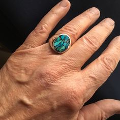 Please note that each ring is unique, one of a kind. The ring pictured is a sold example. Any ring purchased from this listing will have a similar look and feel and is returnable. Each ring is inlaid by hand using finest gem quality natural, undyed, untreated, blue to blue-green turquoise. This is very rare Nevada turquoise that is no longer mined or available that has been in my personal collection for almost 40 years. Each select piece of turquoise is carefully set in a hard and durable resin Southwestern Polished Turquoise Ring, Southwestern Style Polished Turquoise Ring, Blue Oval Rings With Inlay, Unique Turquoise Multi-stone Opal Ring, Unique Turquoise Opal Ring With Multi-stone Design, Artisan Multi-stone Turquoise Ring, Elegant Turquoise Inlay Rings, Blue Turquoise Ring With Inlay, Turquoise Multi-stone Round Opal Ring