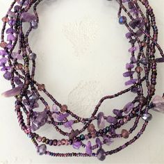 Artisan Czech Glass Bead 6 Strand 18" Long Fashion Statement Necklace Purple A Total Length Of 18" Long, With Glass Beads & Semi Precious Stone Chips. Easy To Open/Close Magnetic Clasp. One Of A Kind Necklace Handcrafted/No Two Are Exactly Alike Czech Glass Beads Are Know World Wide For Their Quality, Vibrant Colors Handmade In Guatemala Using Artisan Crafted Czech Glass Beads. Principles Of Fair Trade Are Upheld. Artisan Purple Adjustable Necklace, Hand-strung Beaded Necklaces With Round Beads For Party, Hand-strung Beaded Necklaces For Party With Round Beads, Hand-strung Beaded Necklace For Party With Round Beads, Hand-strung Purple Bohemian Beads, Purple Hand-strung Bohemian Beads, Bohemian Hand-strung Purple Beads, Purple Bohemian Hand-strung Beads, Bohemian Beaded Necklaces With Natural Stones For Party