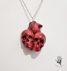 This anatomical heart in the shape of two merging skulls is a perfect gift for lovers of the unusual! Made and painted completely by hand creating a truly realistic blood effect, it is the perfect gift to give to the person of your heart. The size of the whole heart is 1.5748 inches wide x 1,88976 inches high. The chain is 20,4724 inches long. The chain is made of stainless steel. but if you have special needs do not hesitate to contact me! Cool Things To Have, Blood Effect, Spike Bracelet, Anatomical Heart, Pretty Bracelets, Jewelry Lookbook, Whole Heart, Heart Decorations, For Lovers